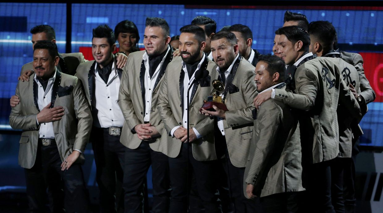 Banda El Recodo accept the award for best banda album for "Mi Vicio Mas Grande" during the 2015 Latin Grammy Awards in Las Vegas, Nevada November 19, 2015. REUTERS/Mario Anzuoni